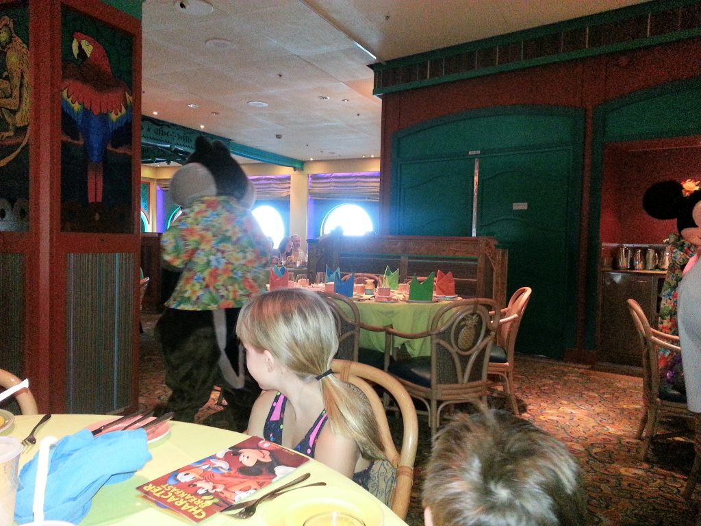 Watching characters in dining room on Disney cruise.